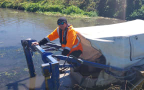 Hawke’s Bay Regional Council catchment worker and weed boat driver Rodger Shaw at Tutaekuri-Waimate Stream.