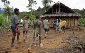 Children of the Andai tribe attend the single-room Lutheran school in Kaiam village in the remote East Sepik province of Papua New Guinea, 05 July 2007.