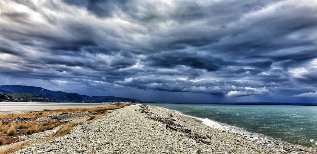 Hailstorm over Tasman. weather, cloudy, clouds, rain.