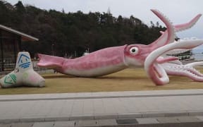 A Japanese town has spent 25 million yen of emergency Covid-19 funding to build the statue of a flying squid.
