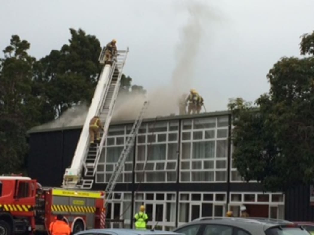 Smoke can be seen coming out of Titirangi Memorial Hall.