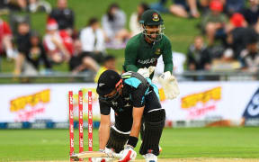 New Zealand player Daryl Mitchell is bowled during the First T20 International New Zealand Blackcaps v Bangladesh. McLean Park, Napier, 2023.
