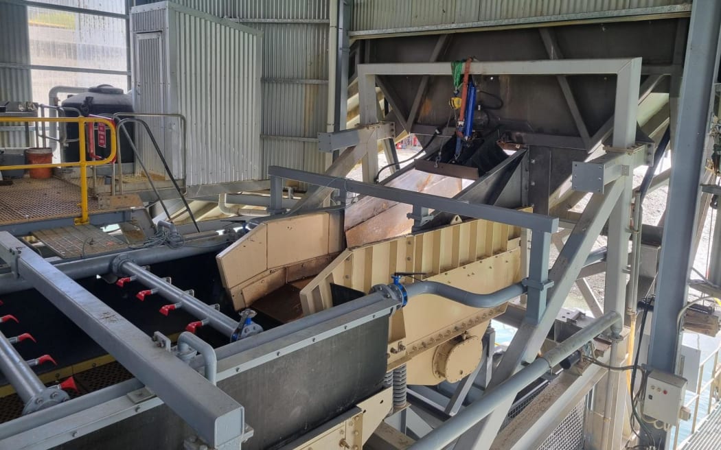A vibrating platform that has 36 millimetre holes to help sift through the gravel at Millers Flat gold mine.