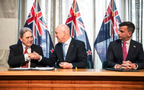 NZ First leader Winston Peters, National Party leader Christopher Luxon and ACT Party leader David Seymour at the formal signing ceremony on 24 November, 2023.