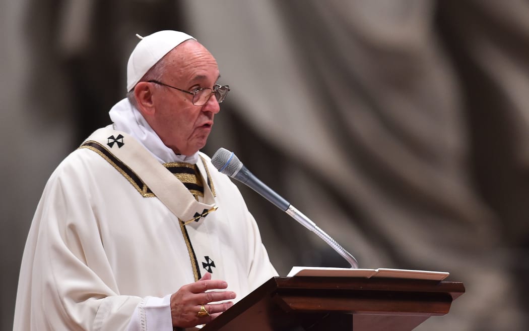Pope Francis at a Christmas eve Mass in St Peter's Basilica.