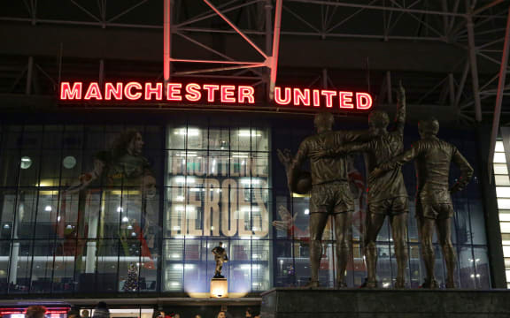 Trinity statue of former legendary Manchester United players George Best, Denis Law and Sir Bobby Charlton, Old Trafford.