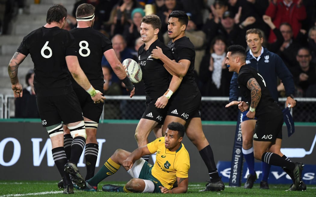 All Blacks celebrate Beauden Barrett's try.