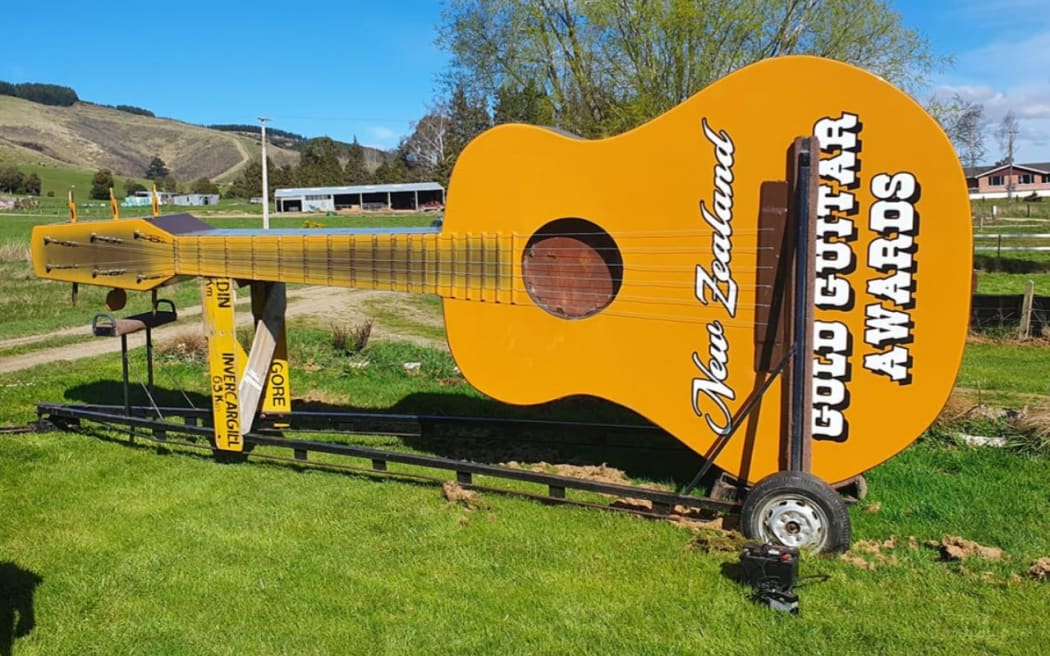 Gore's iconic Gold Guitar.