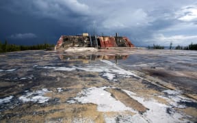 A picture shows a general view of the hard-surfaced advanced recording base PEA "Denise" in the north zone of the Moruroa (Mururoa) atoll, southern Pacific ocean, where French forces have conducted 138 nuclear weapon tests until 1996, on February 13, 2014.