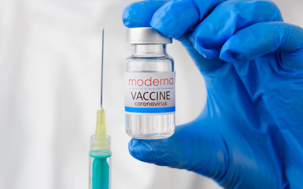 Moderna vaccine and disposable syringe for injection in doctors hands. Prevention of coronavirus, Sars-cov-2, Covid-19, January 2021, San Francisco, USA
