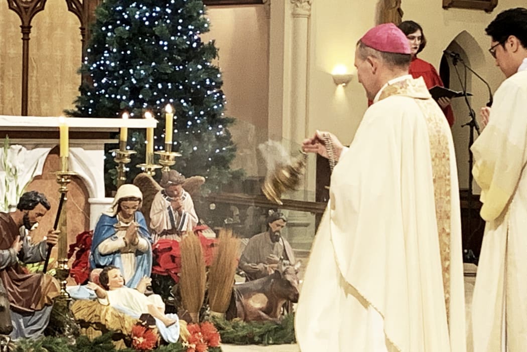 Bishop Gielen censes the Nativity scene at St Patrick's Cathedral