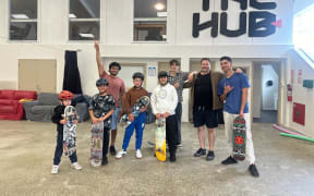 Students and instructors at the Dunedin Indoor Skatepark, with founder Danny Healy second from right.