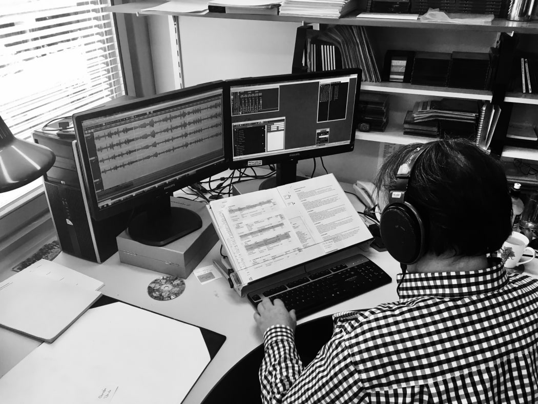 RNZ Concert Producer David McCaw working with his beloved Sennheiser HD 650 headphones.