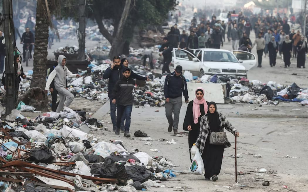 Palestinians in Gaza return to their homes after the ceasefire took effect.