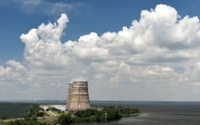 Two cooling towers dominate the landscape as the Zaporizhzhia Nuclear Power Plant is situated on the bank of the Kakhovka Reservoir formed on the Dnipro River, Enerhodar, Zaporizhzhia Region, southeastern Ukraine, July 9, 2019.NO USE RUSSIA. NO USE BELARUS. (Photo by Dmytro Smolyenko / NurPhoto / NurPhoto via AFP)