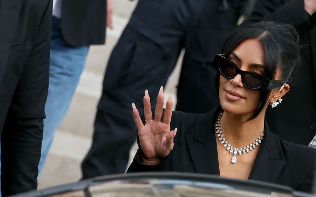 US celebrity Kim Kardashian leaves the courthouse after testifying before the Assize Court for the trial over the 2016 robbery that saw her relieved of millions of dollars' worth of jewellery at gunpoint in Paris, on May 13, 2025. The trial of this sensational nine million euro jewellery robbery opened in Paris on April 28, 2025. (Photo by Alain JOCARD / AFP)