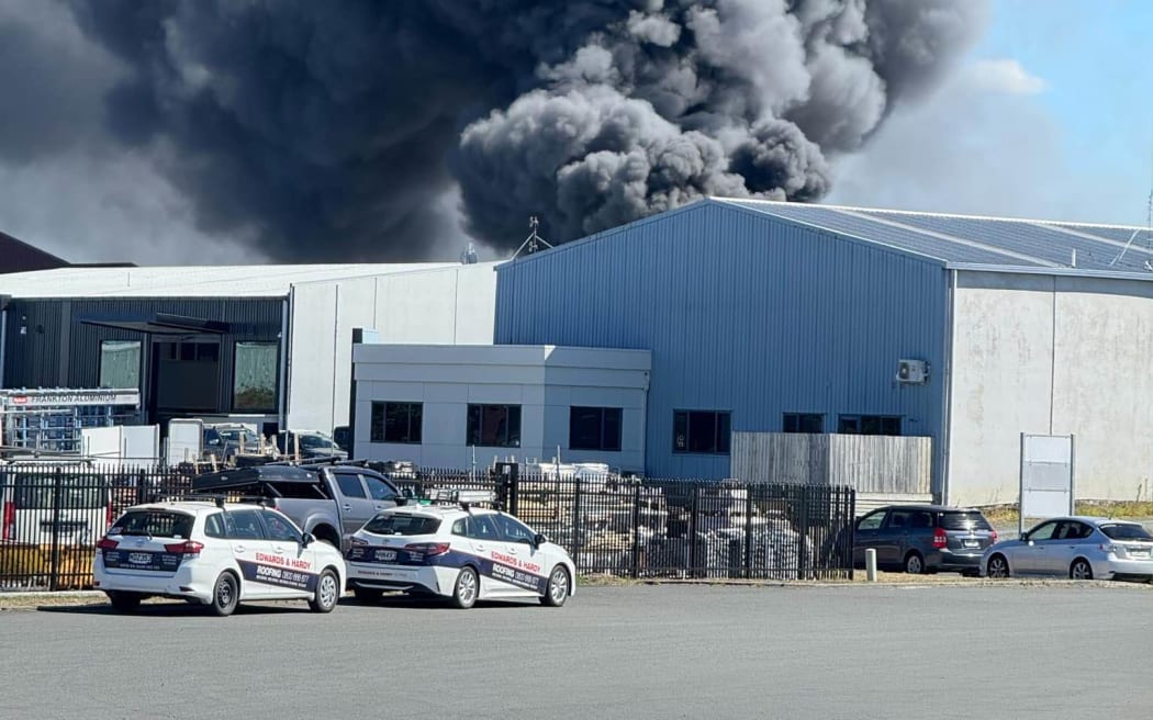 A commercial building is on fire in the Hamilton suburb of Frankton