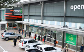 People queueing at a distance from each other outside Countdown, Crofton Downs, Wellington.