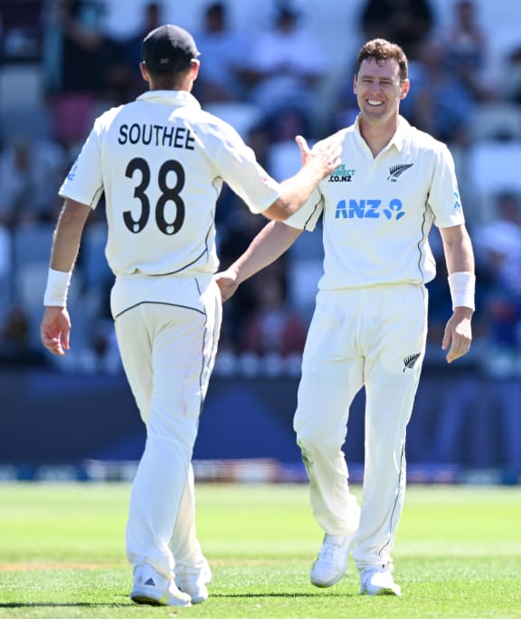 Tim Southee congratulates Matt Henry on his 5 wicket bag against Australia at the Basin Reserve, 2024.