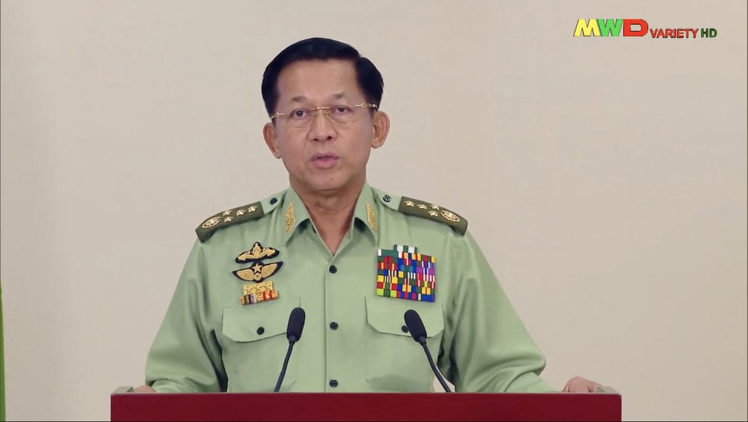 Myanmar military chief General Min Aung Hlaing makes an announcement on the nationwide demonstrations being held in protest over the military coup.