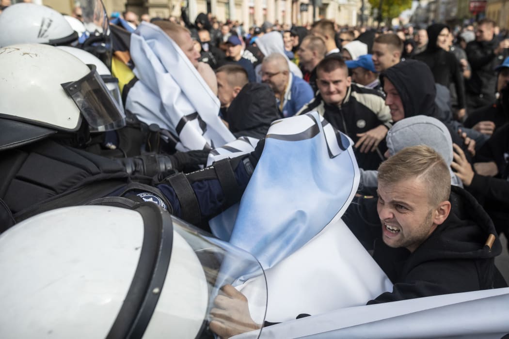 Far right extremists clash with riot police as they try to disrupt the Gay Pride parade in Lublin, eastern Poland, on September 28, 2019.