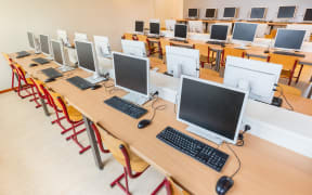 Rows of computers in a classroom