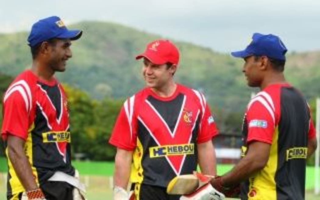 Geraint Jones, (center), with PNG Barramundi team-mates