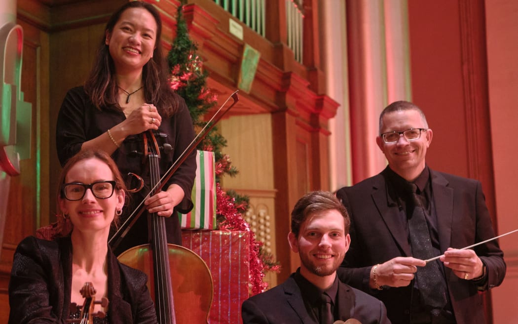 Auckland Philharmonia musicians with Christmas Cheer conductor David Kay.