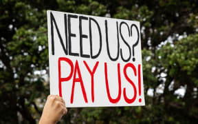 A protest seeking higher wages for health technicians, outside Parliament in March 2025.