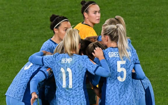 England players celebrate their first goal during the Australia and New Zealand 2023 Women's World Cup semi-final football match between Australia and England at Stadium Australia in Sydney on August 16, 2023. (Photo by Saeed KHAN / AFP)