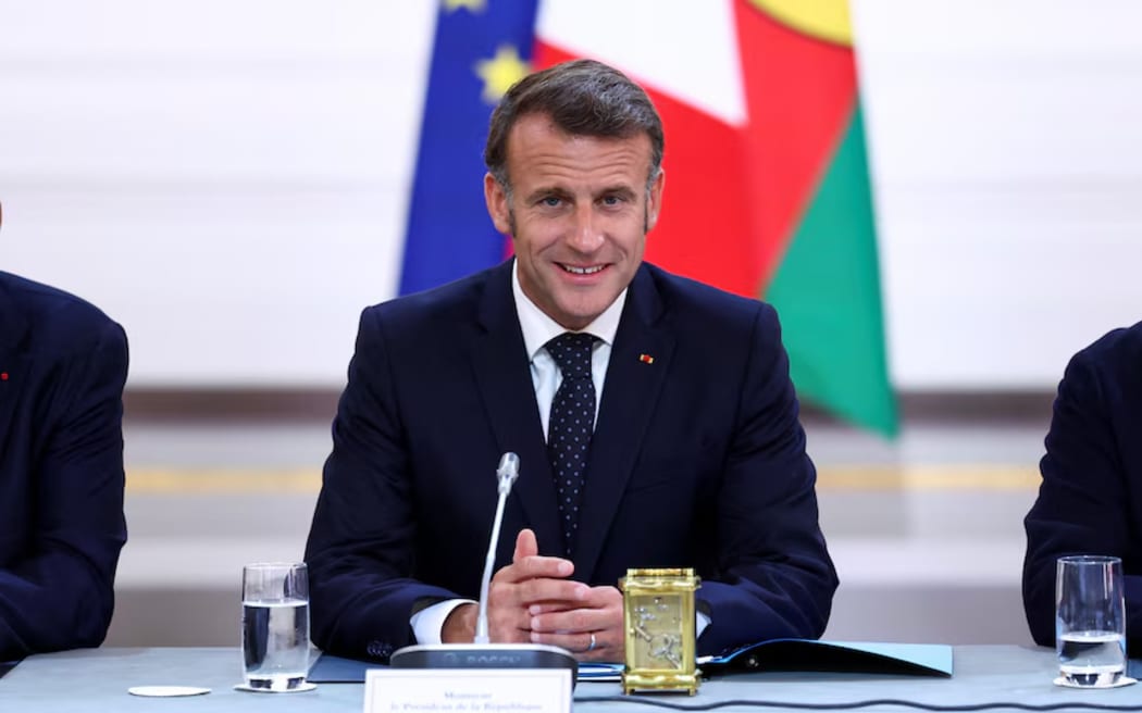 Emmanuel Macron says he hopes the new chapter will bring peace to New Caledonia. (Reuters: Tom Nicholson)