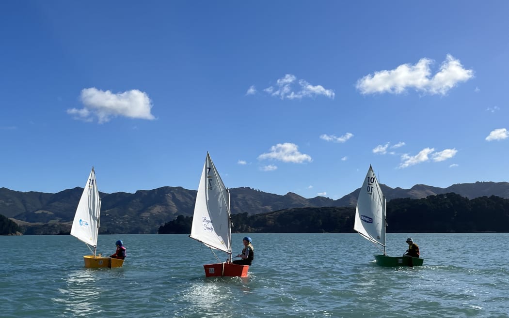 Optimists sailing at Charteris Bay Yacht Club.