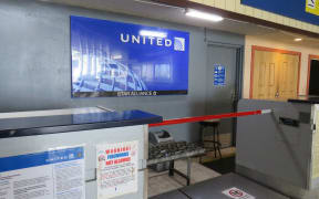 The United Airlines check in area at Amata Kabua International Airport in Majuro: the airline recently vacated its office behind the check in area due to safety hazards and a just-discovered two-year-old engineering report confirms the main terminal roof poses a danger of collapse.