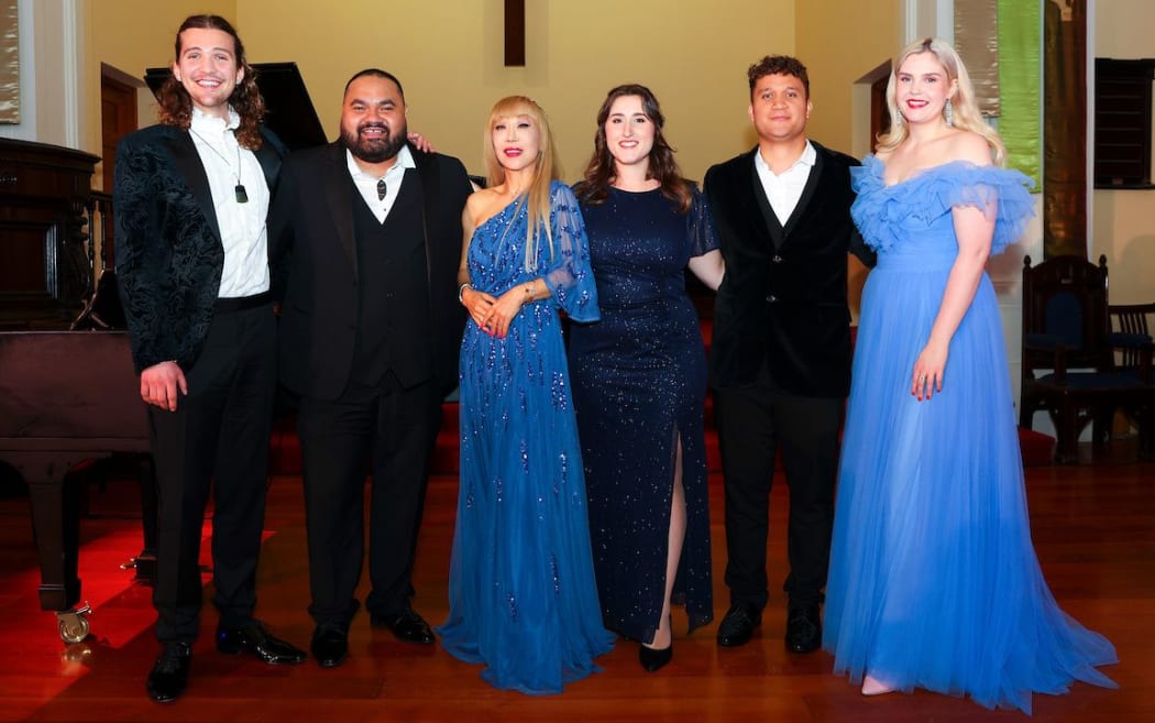 The five finalists and judge of the 2024 Lexus Song Quest. (L-R) Austin Haynes, Manase Latu, Sumi Jo (head judge), Katie Trigg, Morgan-Andrew King, Tayla Alexander.