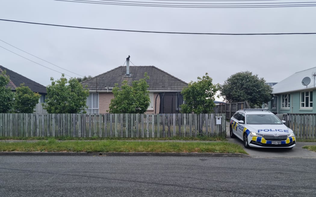 Police have raided two properties near the site of a stabbing at Bexley Park in Christchurch that left a man critically injured on 14 November.