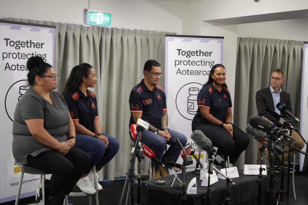 Some of the border workers to be vaccinated against Covid-19 and Director-General of Health Dr Ashley Bloomfield (right) at a media briefing.