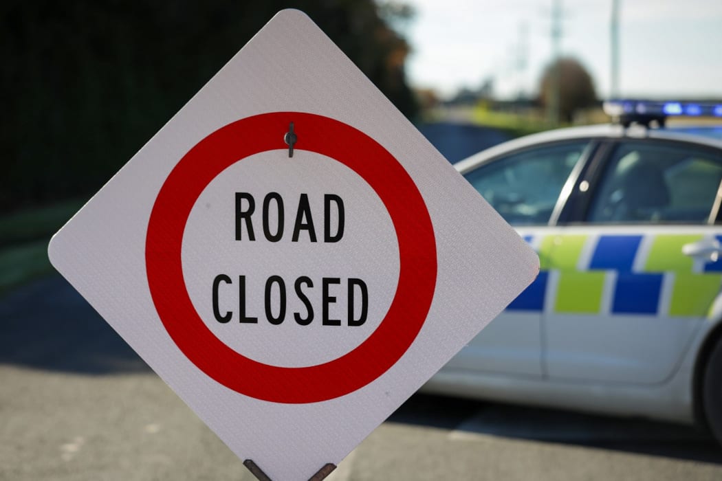 The scene of a crash where four people died after a truck and van collided near Ashburton.