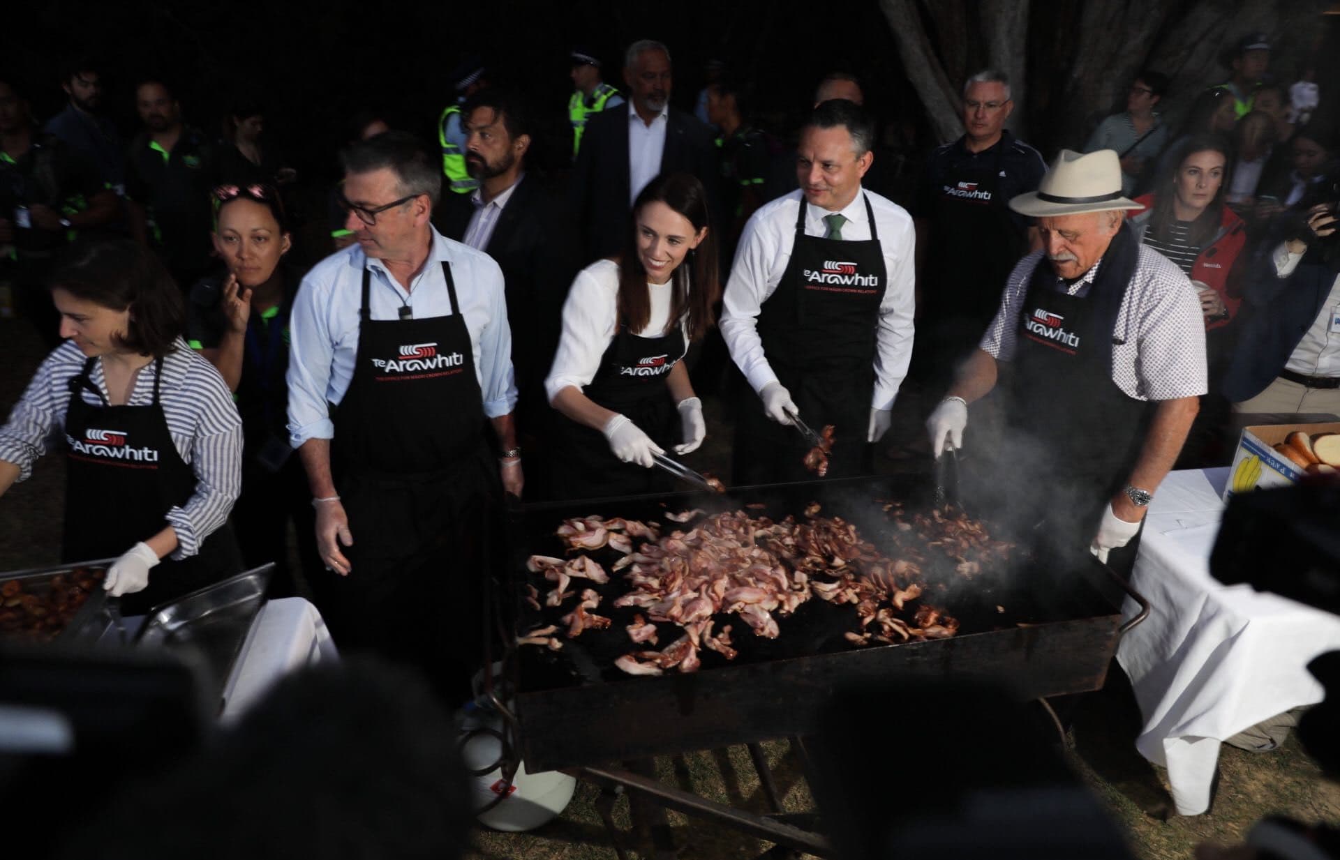 Prime Minister Jacinda Ardern and other ministers serving up breakfast at Waitangi.
