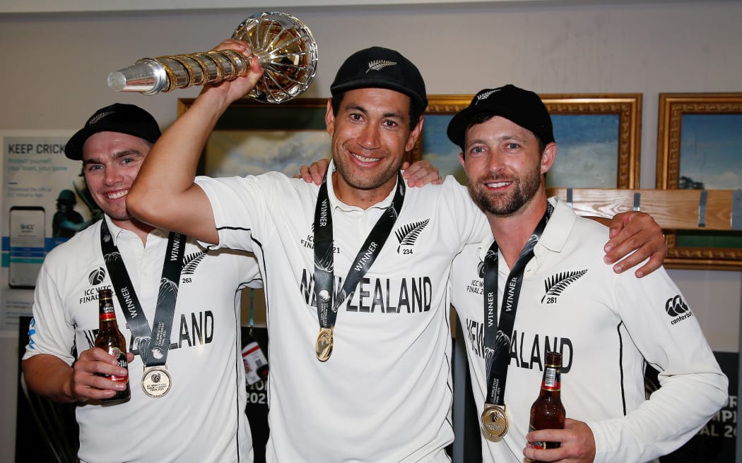 New Zealand Batsmen (l-r) Tom Latham, Ross Taylor and Devon Conway celebrate with the World Test Championship Mace after victory over India