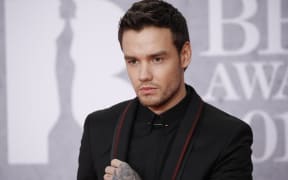 British singer-songwriter Liam Payne poses on the red carpet on arrival for the BRIT Awards 2019 in London on February 20, 2019. (Photo by Tolga AKMEN / AFP) / RESTRICTED TO EDITORIAL USE – NO POSTERS – NO MERCHANDISE– NO USE IN PUBLICATIONS DEVOTED TO ARTISTS