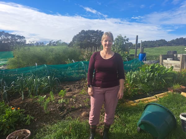 Pia Whittwer by her vege garden on her homestead near Warkworth.