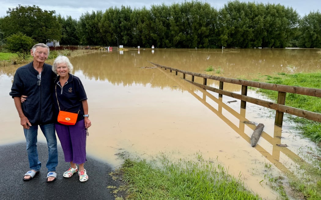 David and Joy Wickham viewing the caravan parking spot at Ōtorohanga College, that they had to evacuate in the dark during flooding. On 14 February, 2026.