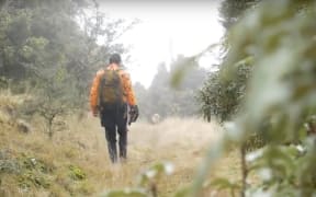Cam Stevenson, and his border collie Pig, are part of a hit team of professional hunters tasked with cleansing the area of feral goats.