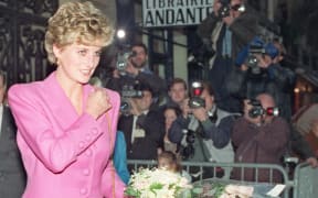 In this file photo taken on 14 November 1992 Princess Diana leaves a bookshop in Paris.