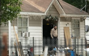 CLEVELAND, TX - APRIL 29: Law enforcement respond to a crime scene where five people, including an 8-year-old child, were killed after a shooting inside a home on April 29, 2023 in Cleveland, Texas. The alleged gunman, who is not yet in custody, used an AR-15 style rifle to shoot his neighbors which also left at least three others injured.   Go Nakamura/Getty Images/AFP (Photo by Go Nakamura / GETTY IMAGES NORTH AMERICA / Getty Images via AFP)