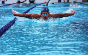 Isaiah Aleksenko won gold in the 2023 Pacific Games after dominating the 200m butterfly event at the Aquatics Center on Wednesday night in Honiara, Solomon Islands. 22 November 2023