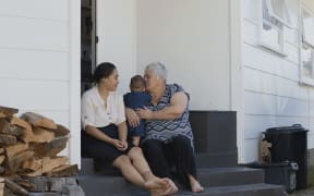 Three generations on Sharon Campbells back porch