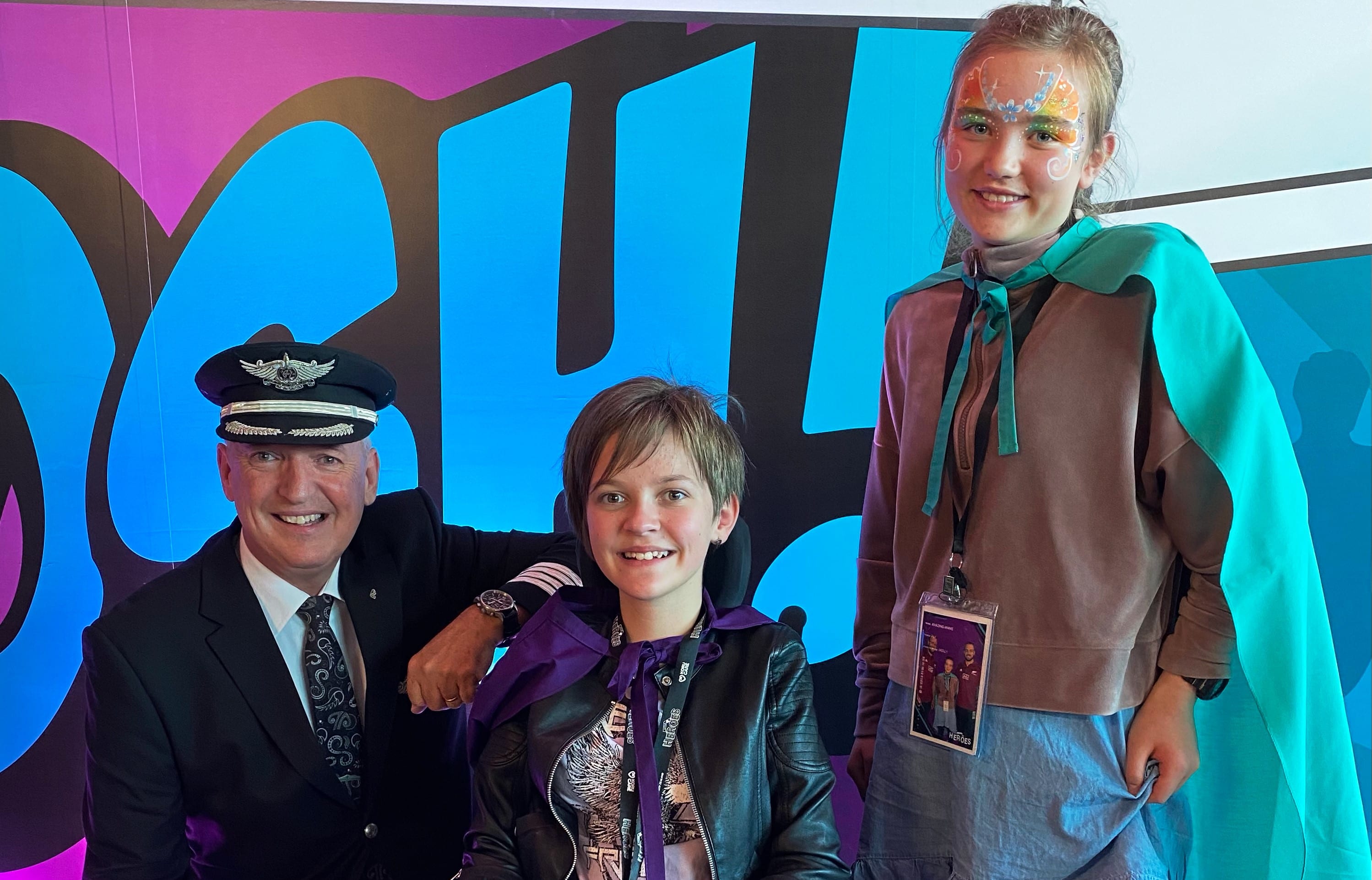 Air NZ chief pilot Captain David Morgan with Lilly, 12, and Annie, 11, before the flight in Christchurch.