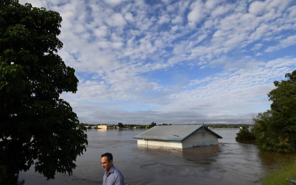 A shed inundated by floodwaters is seen on the banks of the overflowing Clarence River in Grafton, some 130 kms from the New South Wales town of Lismore on March 1, 2022.