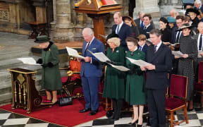 Queen Elizabeth II with Prince Charles, Camilla, Duchess of Cornwall, Princess Anne and Vice Admiral Timothy Laurence, with second row (from left) Prince William, Prince George and Catherine, Duchess of Cambridge at a memorial service for Prince Philip at Westminster Abbey 29 March 2022.